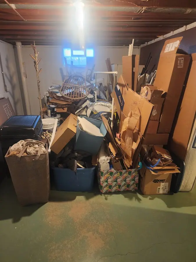 Roll-off dumpster container at job site for Yard Waste Dumpster Rental in Wilson